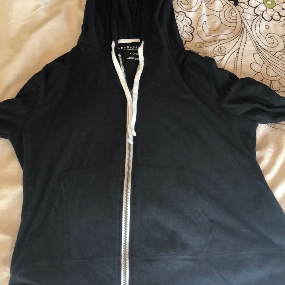 a black light wear zip up sweatshirt.